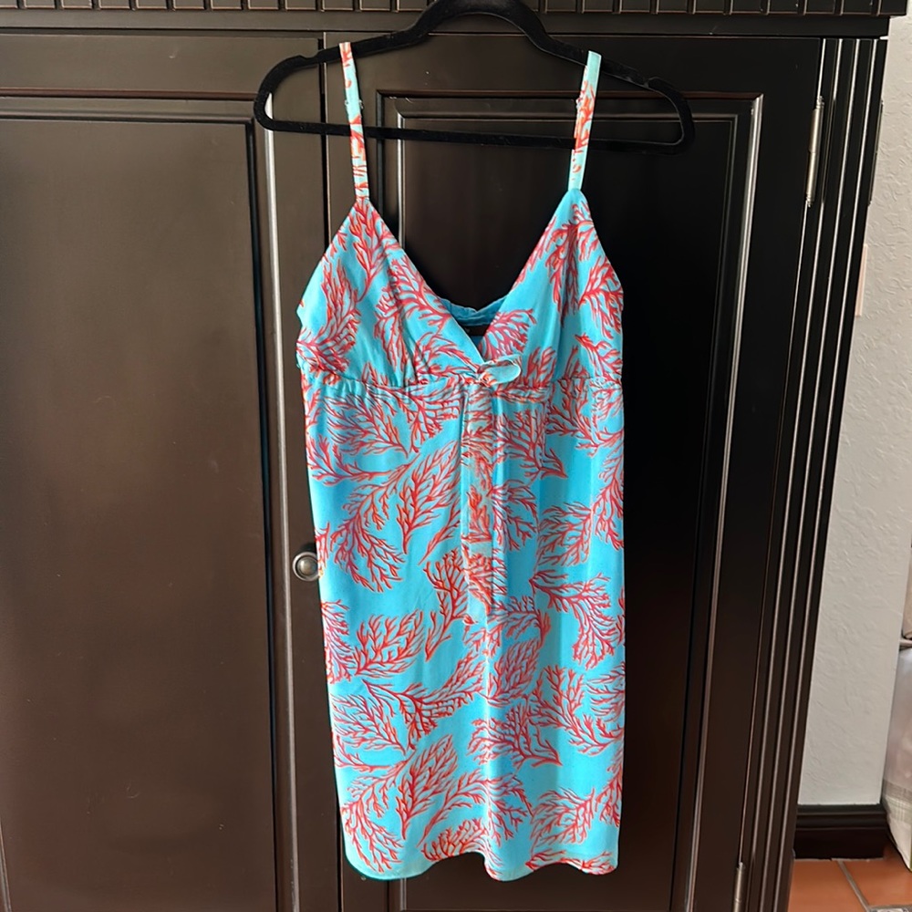 Dress 100% silk baby doll free flowing on from bust down.